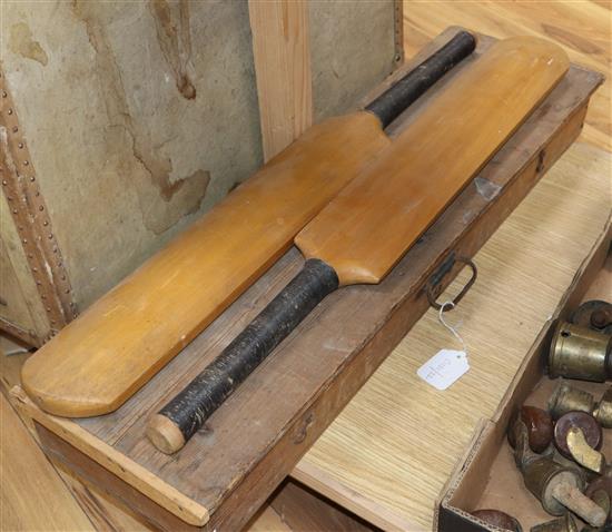 A vintage cricket set and suitcase